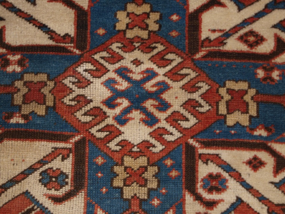 ANTIQUE CAUCASIAN CHELABERD KAZAK SINGLE MEDALLION RUG OF SMALL SIZE, CIRCA 1880. View XIII
