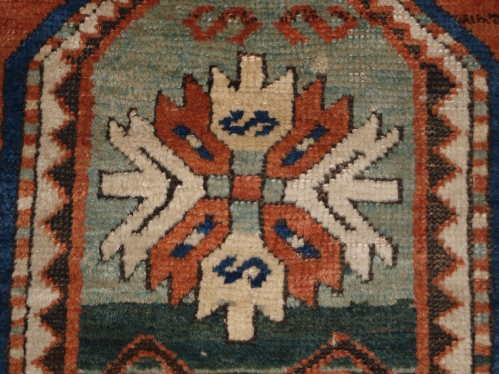 ANTIQUE CAUCASIAN SEWAN KAZAK RUG WITH GREEN GROUND MEDALLION, CIRCA 1890. View XII