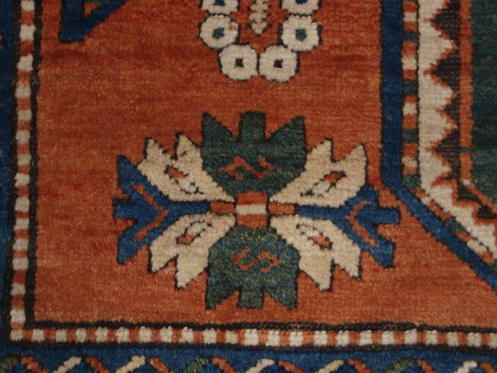 ANTIQUE CAUCASIAN SEWAN KAZAK RUG WITH GREEN GROUND MEDALLION, CIRCA 1890. View XIV