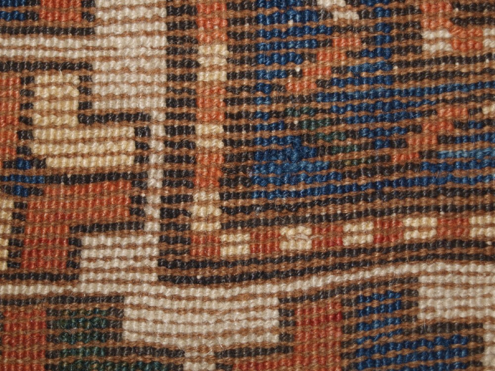 ANTIQUE CAUCASIAN SEWAN KAZAK RUG WITH GREEN GROUND MEDALLION, CIRCA 1890. View XVI