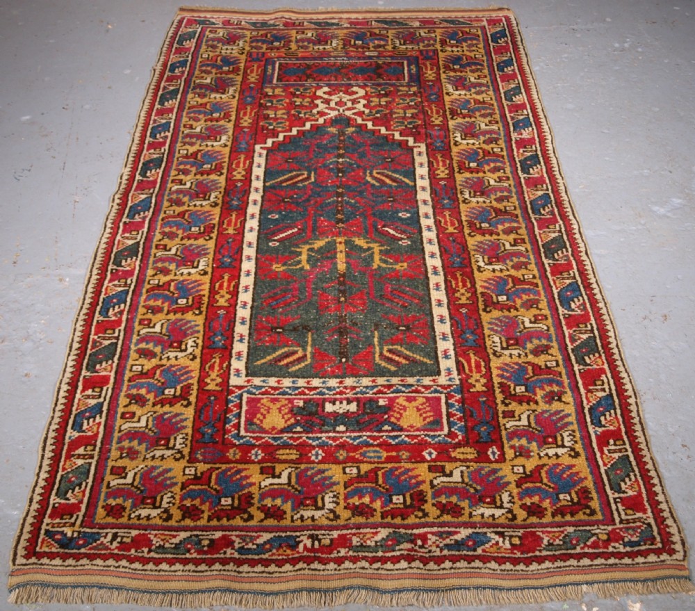 ANTIQUE TURKISH IZMIR REGION PRAYER RUG OF SCARCE TYPE, CIRCA 1890.