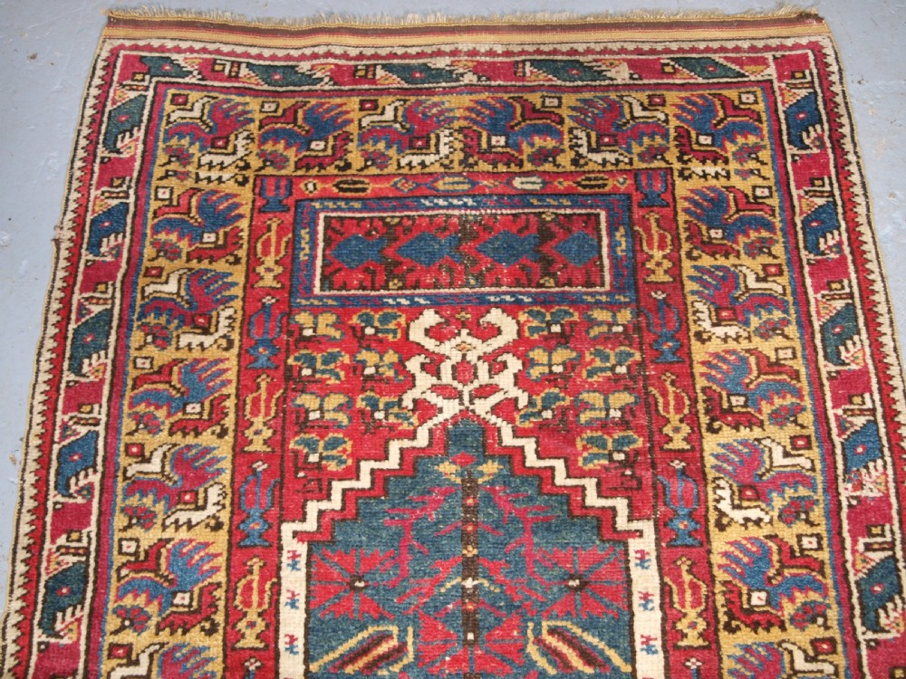 ANTIQUE TURKISH IZMIR REGION PRAYER RUG OF SCARCE TYPE, CIRCA 1890. View IV