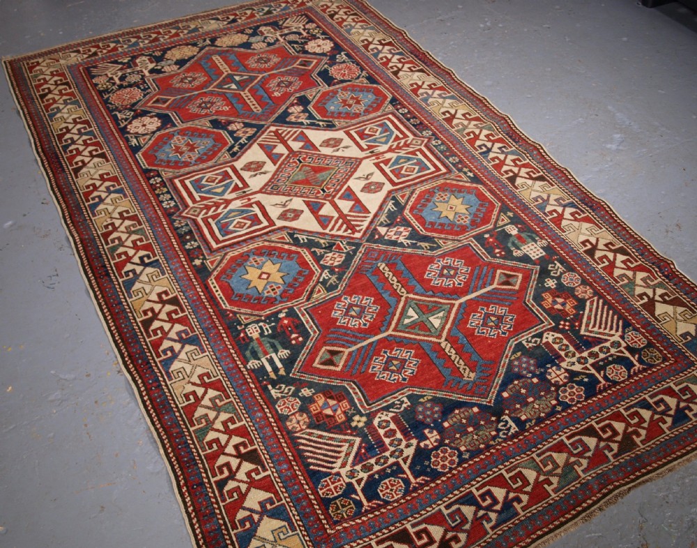 ANTIQUE CAUCASIAN SHIRVAN AKSTAFA STAR MEDALLION RUG, SUPERB, CIRCA 1880. View IV