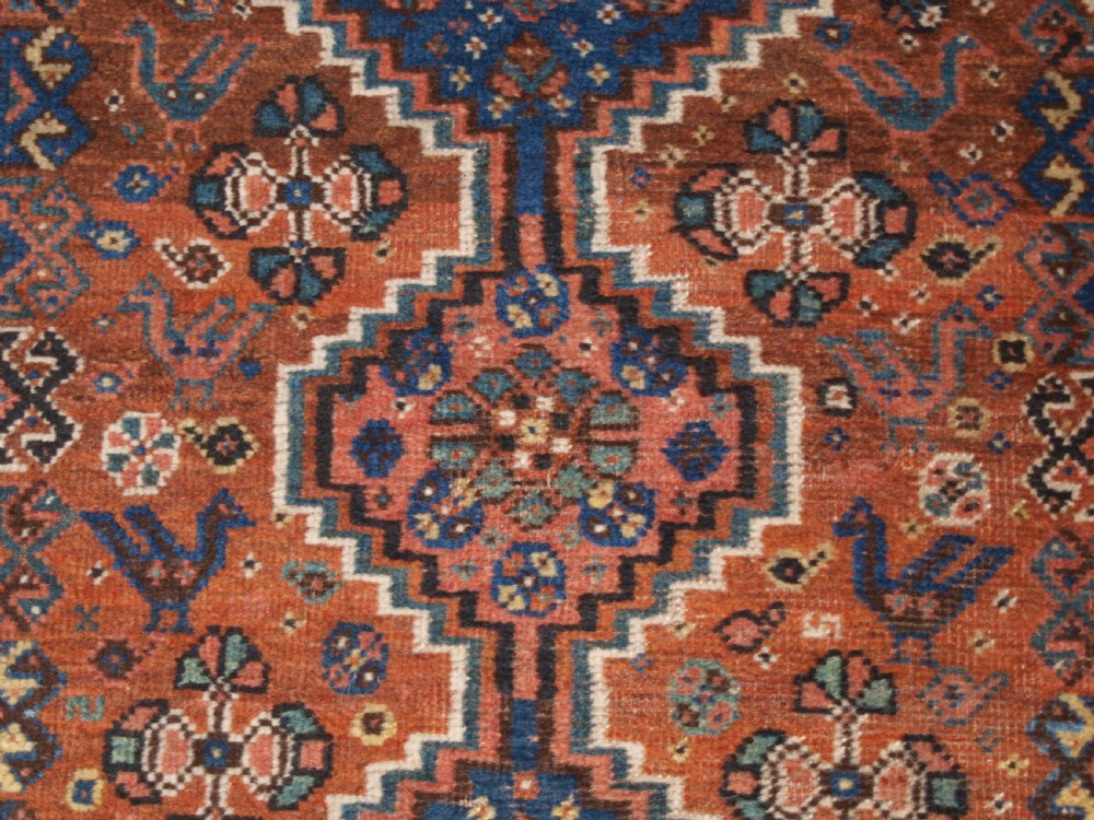 ANTIQUE KHAMSEH SHIRAZ TRIBAL RUG OF SMALL SIZE, CIRCA 1910. View IX