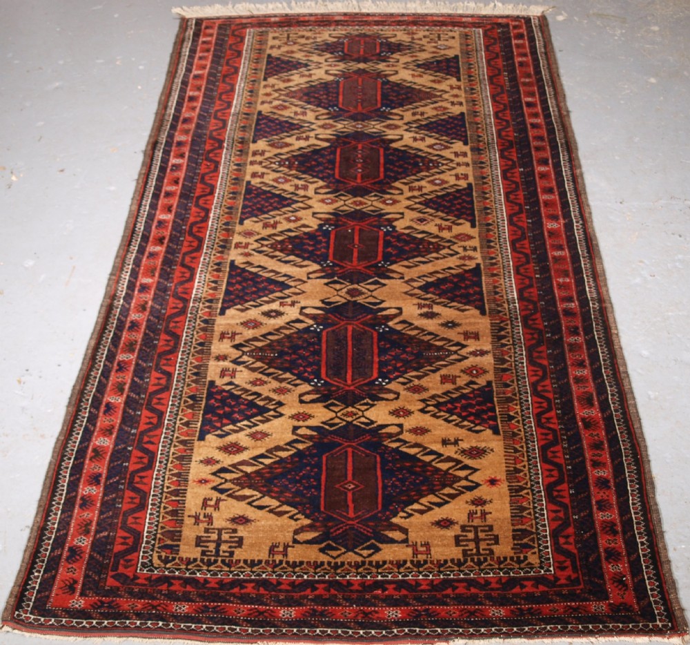 ANTIQUE TIMURI BALUCH RUG OF SCARCE DESIGN, SUPERB CONDITION, CIRCA 1900.