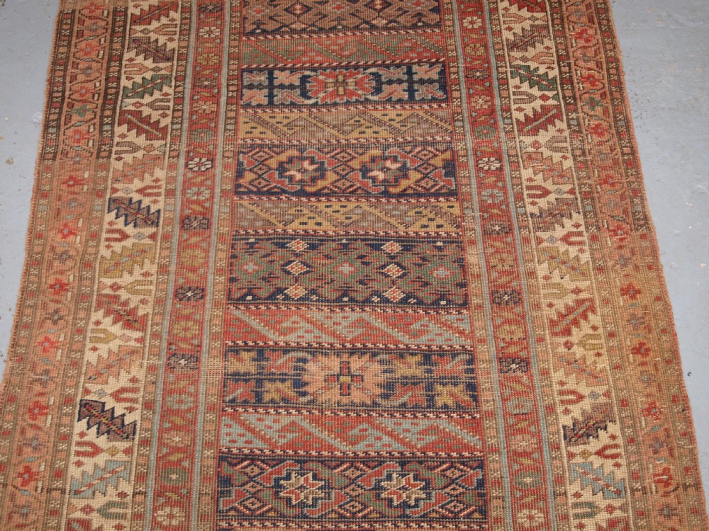 ANTIQUE SOUTH CAUCASIAN KURDISH RUNNER OF UNUSUAL DESIGN, CIRCA 1890. View IV