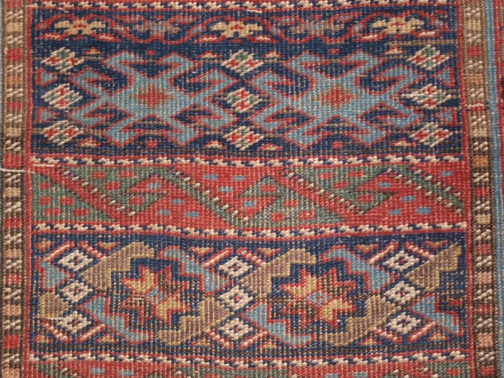 ANTIQUE SOUTH CAUCASIAN KURDISH RUNNER OF UNUSUAL DESIGN, CIRCA 1890. View IX