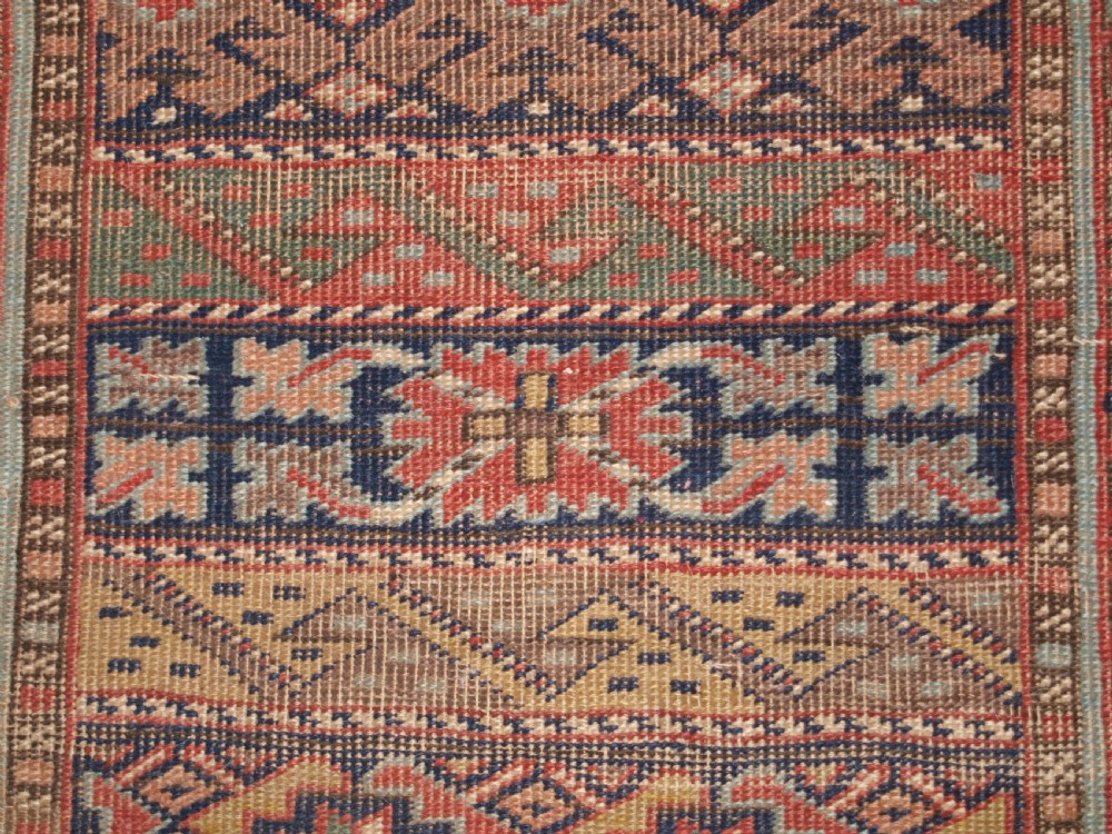 ANTIQUE SOUTH CAUCASIAN KURDISH RUNNER OF UNUSUAL DESIGN, CIRCA 1890. View X