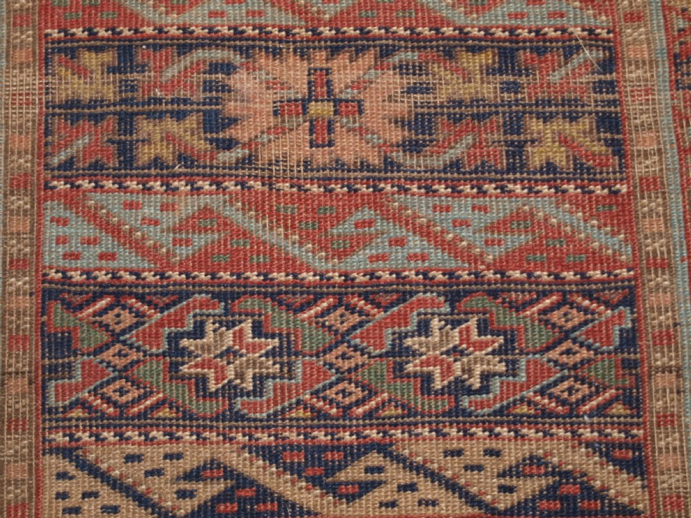 ANTIQUE SOUTH CAUCASIAN KURDISH RUNNER OF UNUSUAL DESIGN, CIRCA 1890. View XII