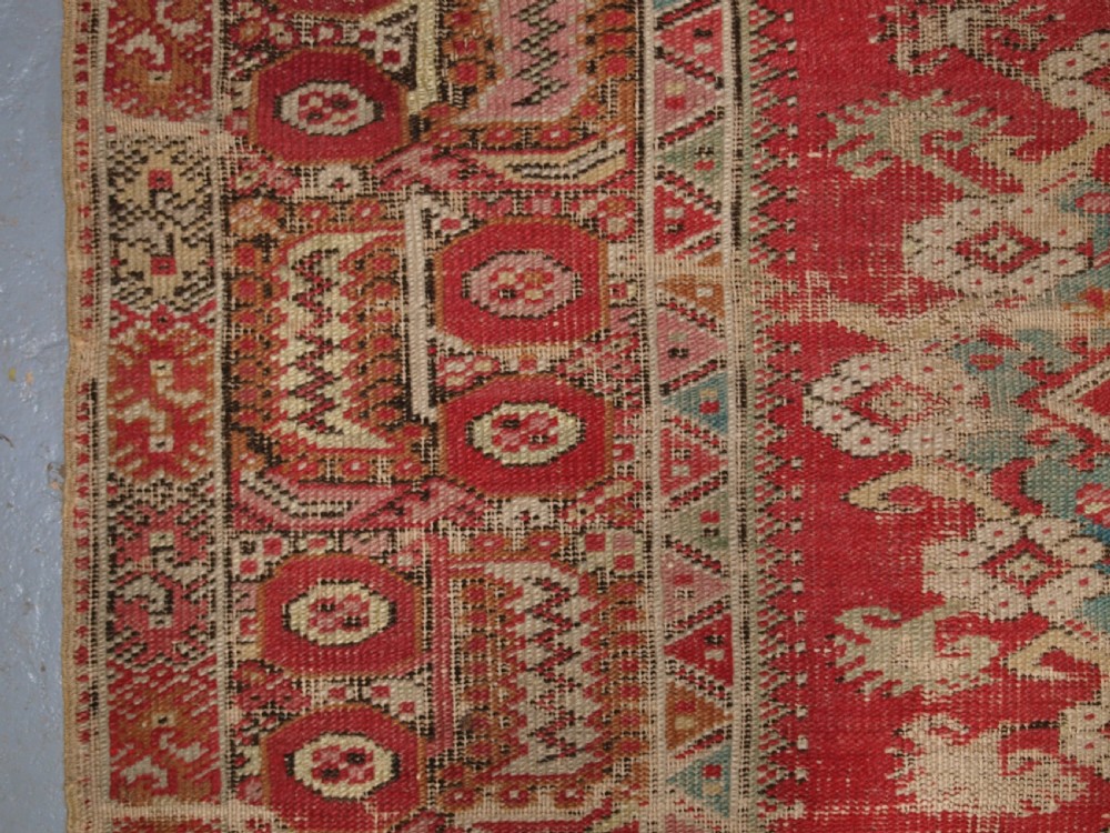 ANTIQUE TURKISH GHIORDES RUG, SOFT COLOURS, LATE 18TH / EARLY 19TH CENTURY. View VII