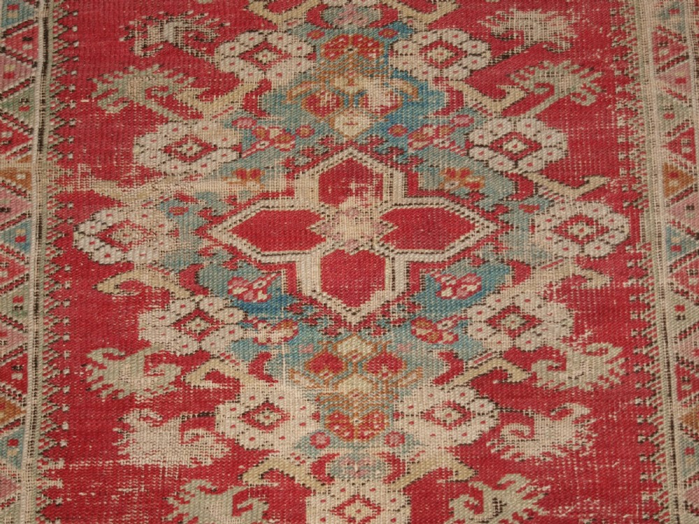 ANTIQUE TURKISH GHIORDES RUG, SOFT COLOURS, LATE 18TH / EARLY 19TH CENTURY. View VIII