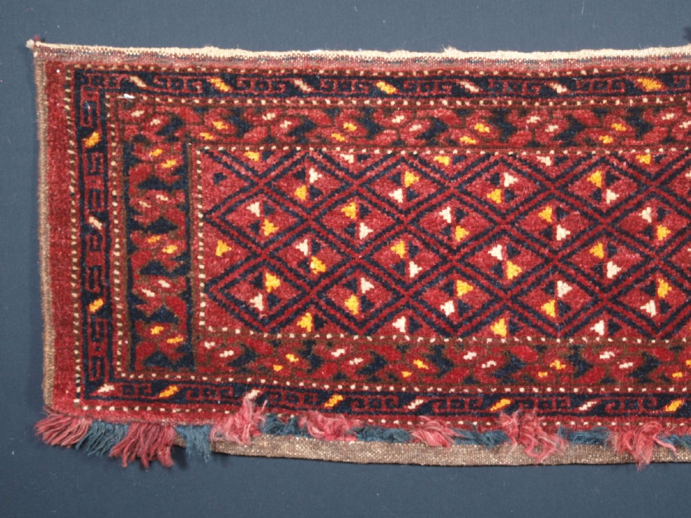 ANTIQUE ERSARI BESHIR TORBA WITH DIAMOND LATTICE DESIGN, CIRCA 1900. View II