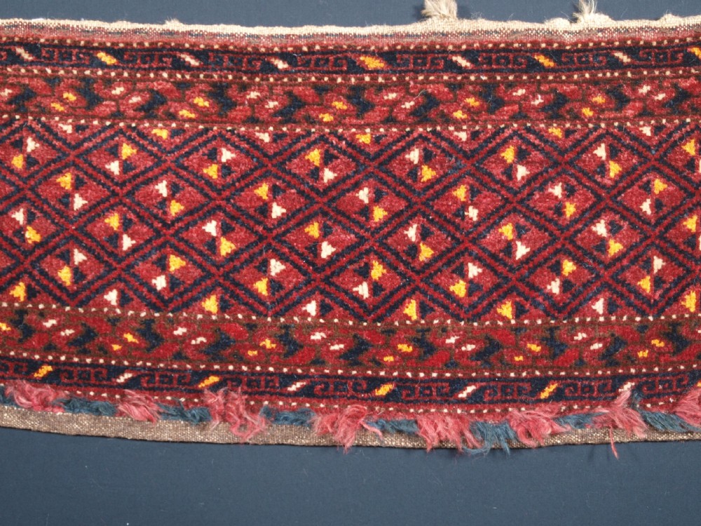 ANTIQUE ERSARI BESHIR TORBA WITH DIAMOND LATTICE DESIGN, CIRCA 1900. View III