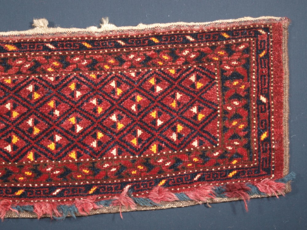ANTIQUE ERSARI BESHIR TORBA WITH DIAMOND LATTICE DESIGN, CIRCA 1900. View V