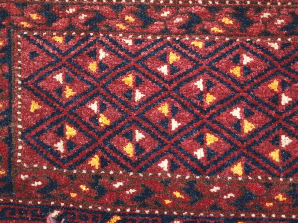 ANTIQUE ERSARI BESHIR TORBA WITH DIAMOND LATTICE DESIGN, CIRCA 1900. View VII
