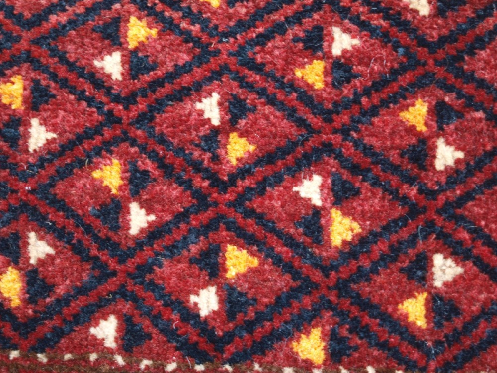ANTIQUE ERSARI BESHIR TORBA WITH DIAMOND LATTICE DESIGN, CIRCA 1900. View IX
