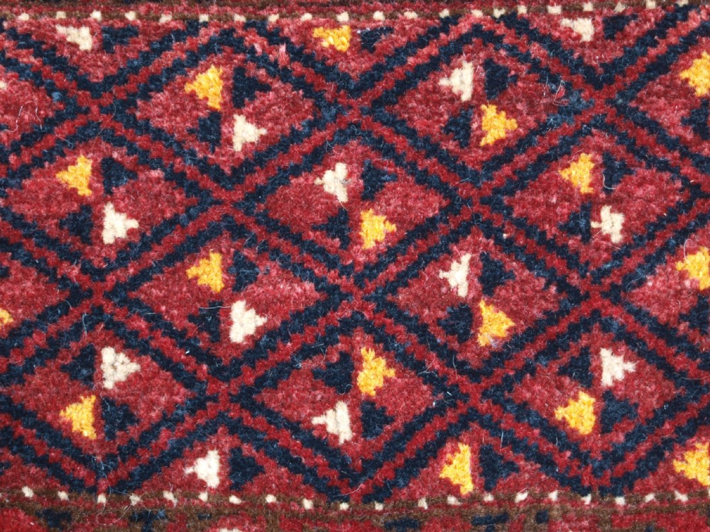 ANTIQUE ERSARI BESHIR TORBA WITH DIAMOND LATTICE DESIGN, CIRCA 1900. View XI