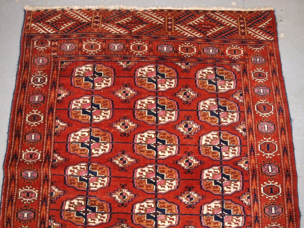 ANTIQUE TEKKE TURKMEN RUG OF SMALL SQUARE SIZE, CIRCA 1900. View III
