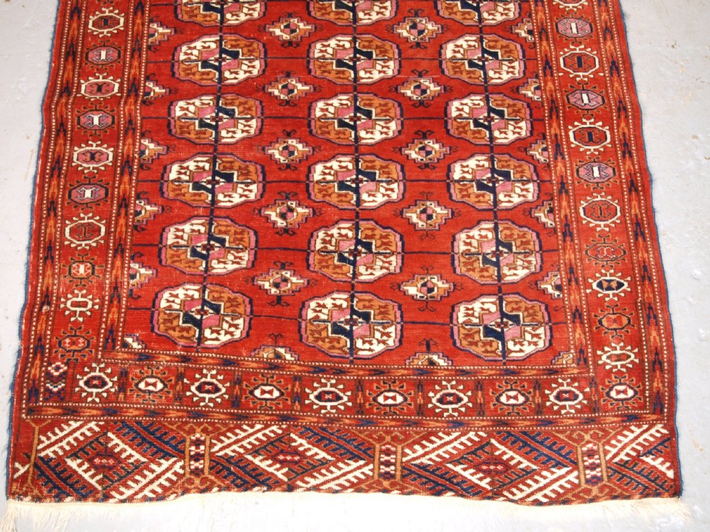 ANTIQUE TEKKE TURKMEN RUG OF SMALL SQUARE SIZE, CIRCA 1900. View IV