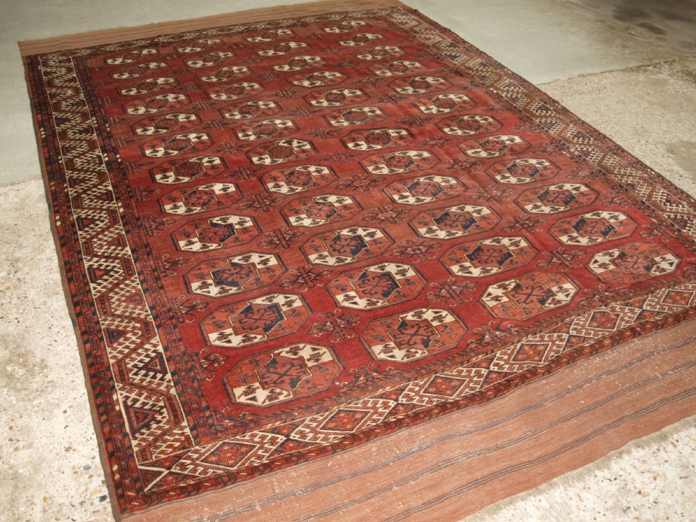 ANTIQUE ERSARI KIZYL AYAK TURKMEN MAIN CARPET, UNUSUAL GUL, CIRCA 1880.