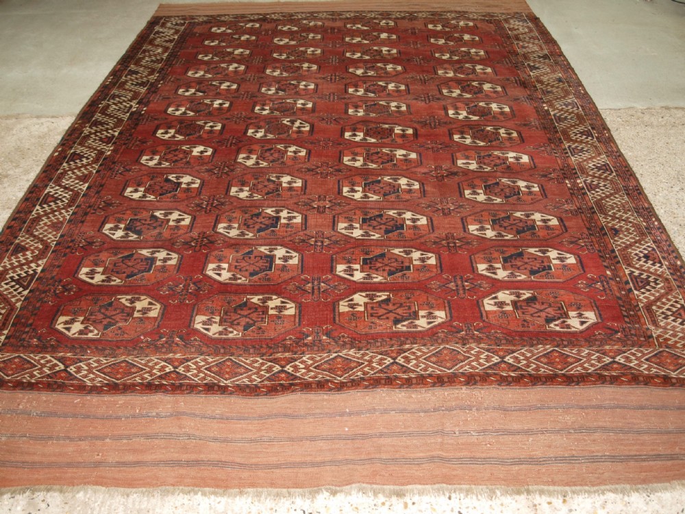 ANTIQUE ERSARI KIZYL AYAK TURKMEN MAIN CARPET, UNUSUAL GUL, CIRCA 1880. View II