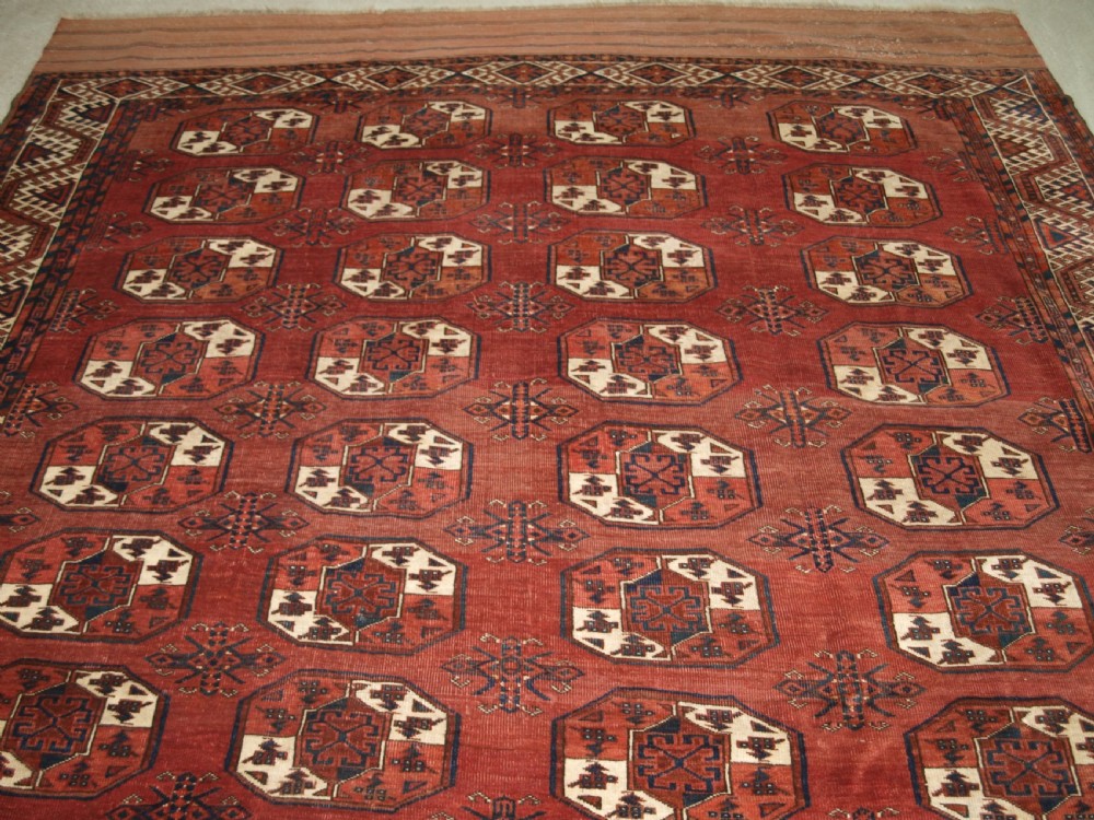 ANTIQUE ERSARI KIZYL AYAK TURKMEN MAIN CARPET, UNUSUAL GUL, CIRCA 1880. View IV