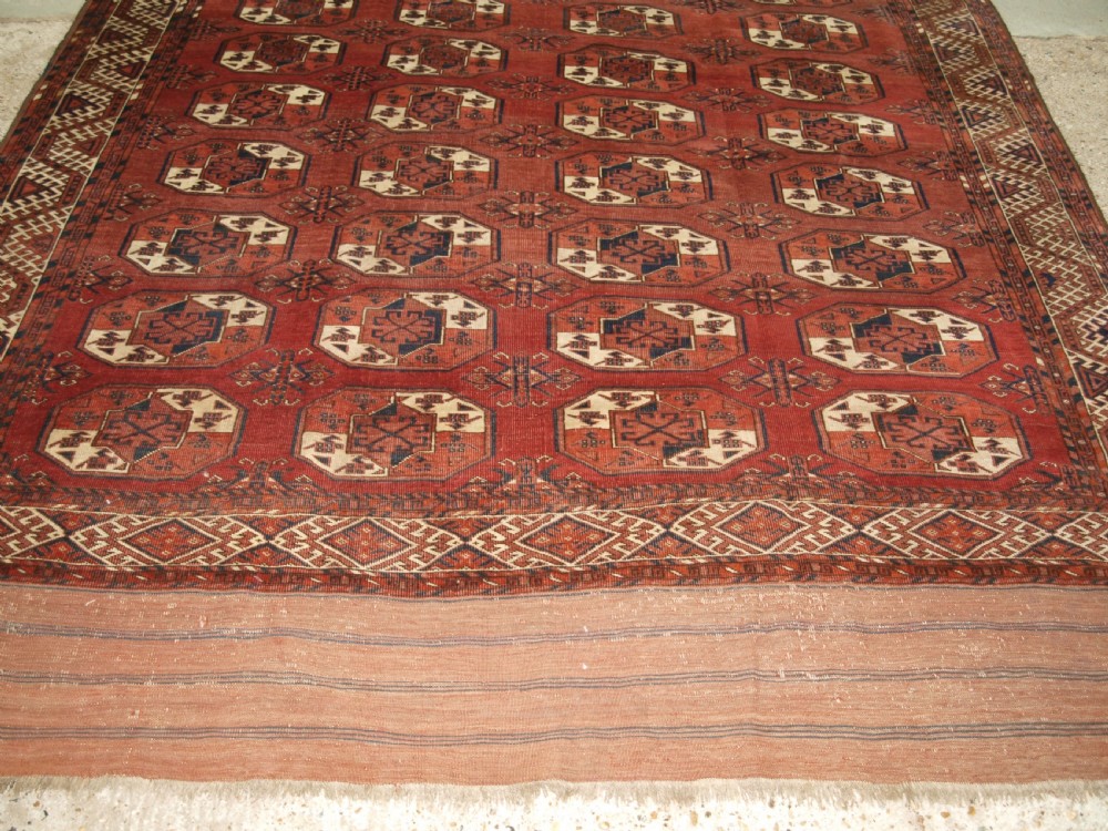 ANTIQUE ERSARI KIZYL AYAK TURKMEN MAIN CARPET, UNUSUAL GUL, CIRCA 1880. View VI