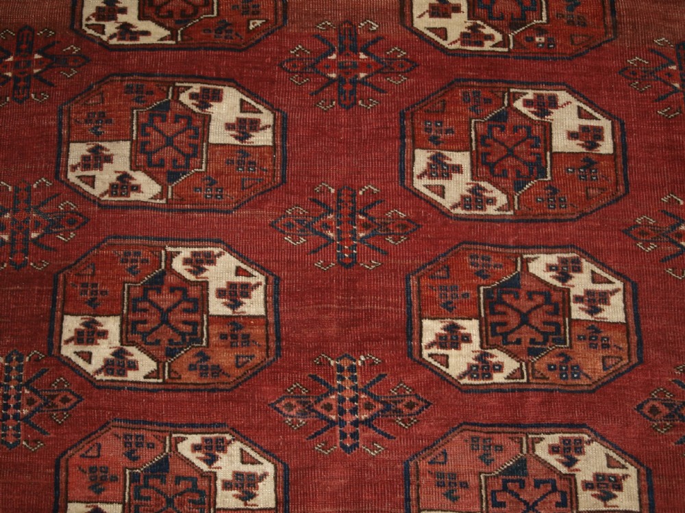 ANTIQUE ERSARI KIZYL AYAK TURKMEN MAIN CARPET, UNUSUAL GUL, CIRCA 1880. View VIII