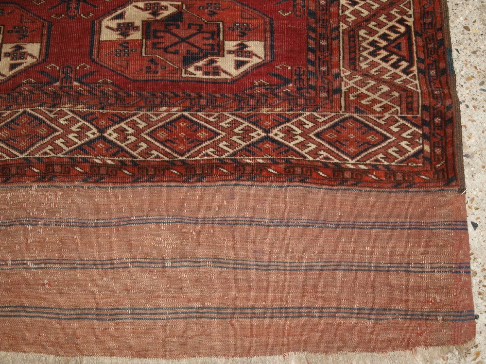 ANTIQUE ERSARI KIZYL AYAK TURKMEN MAIN CARPET, UNUSUAL GUL, CIRCA 1880. View XII