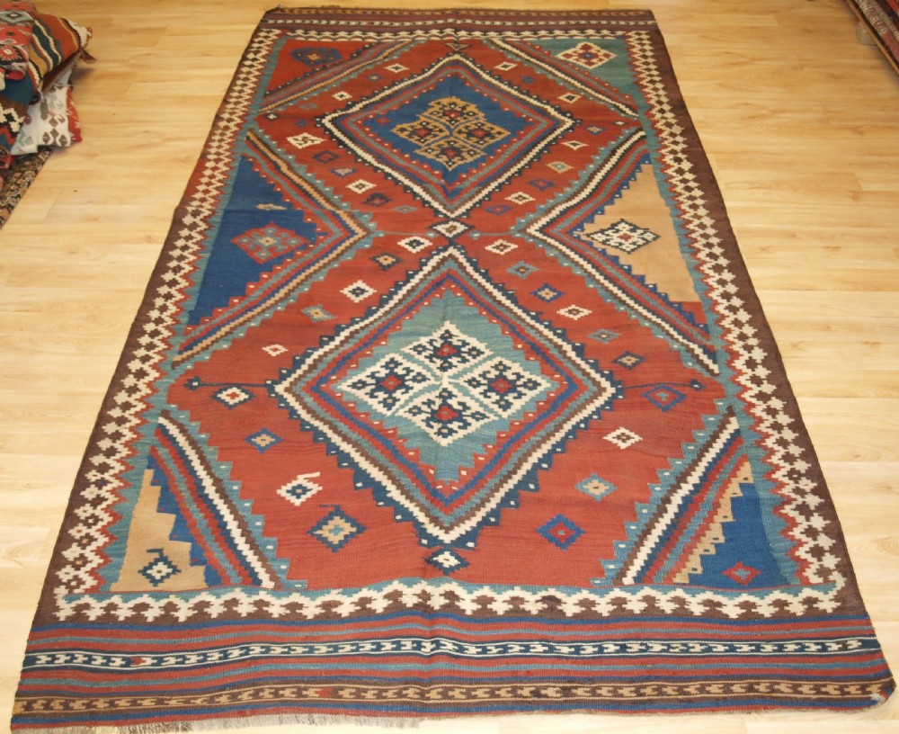 ANTIQUE TRIBAL QASHQAI KILIM, SUPERB COLOUR AND BOLD DESIGN, CIRCA 1900.