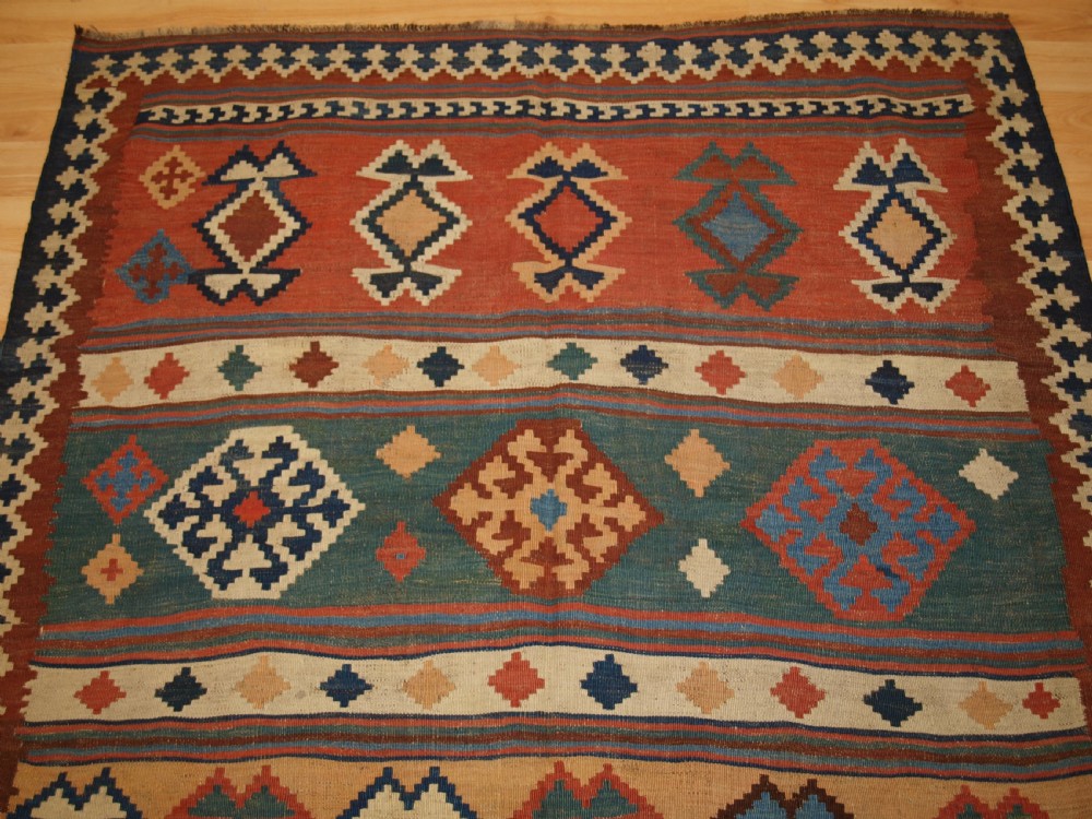 ANTIQUE QASHQAI TRIBAL KILIM WITH BANDED DESIGN, CIRCA 1900. View IV