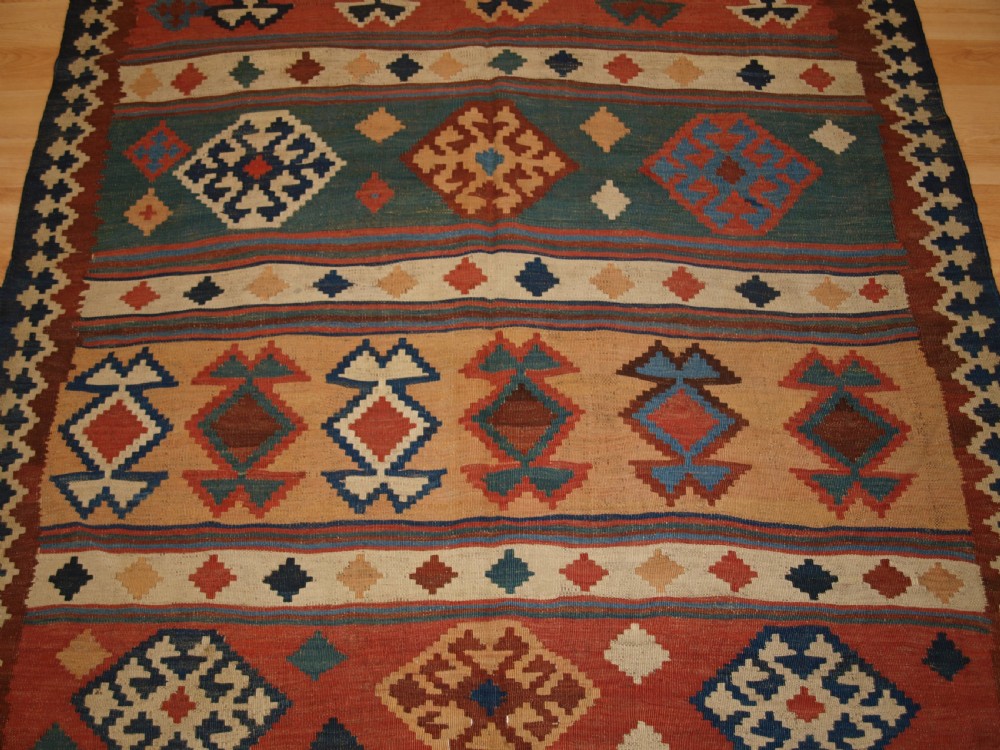 ANTIQUE QASHQAI TRIBAL KILIM WITH BANDED DESIGN, CIRCA 1900. View V