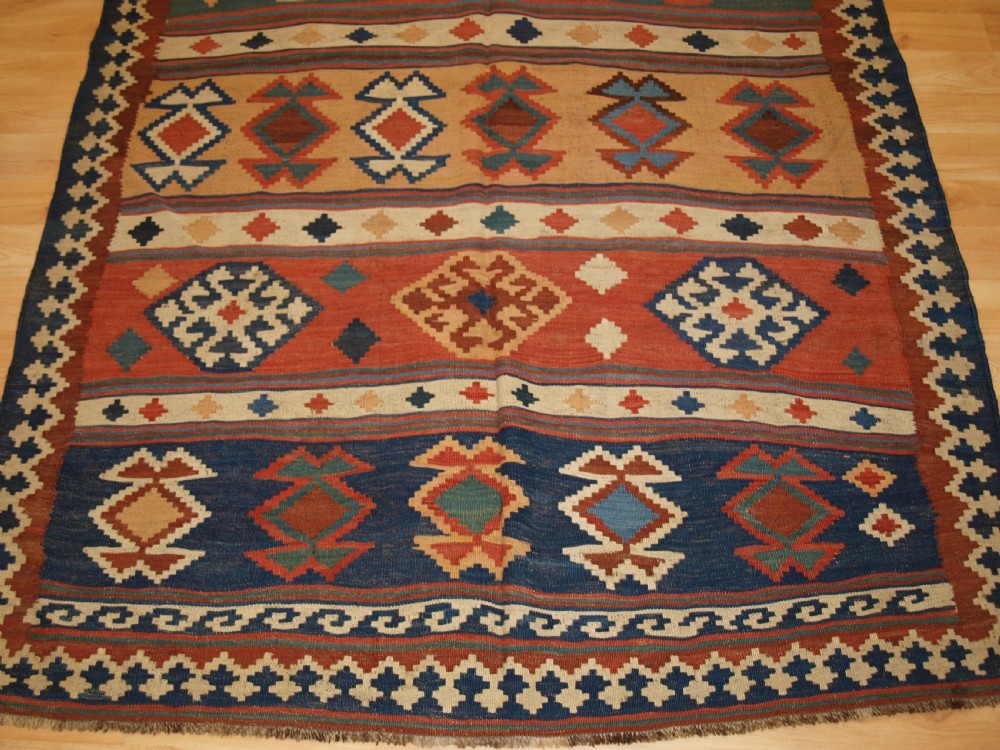 ANTIQUE QASHQAI TRIBAL KILIM WITH BANDED DESIGN, CIRCA 1900. View VI