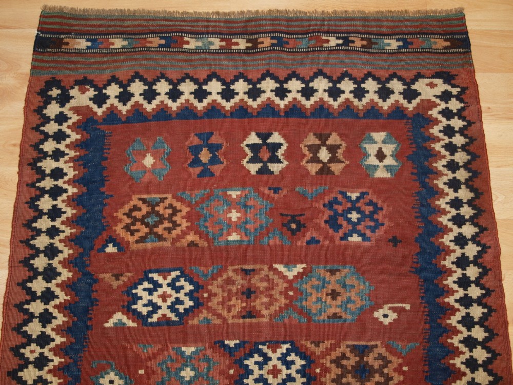 ANTIQUE TRIBAL QASHQAI KILIM SOFREH, EATING CLOTH, CIRCA 1900. View IV
