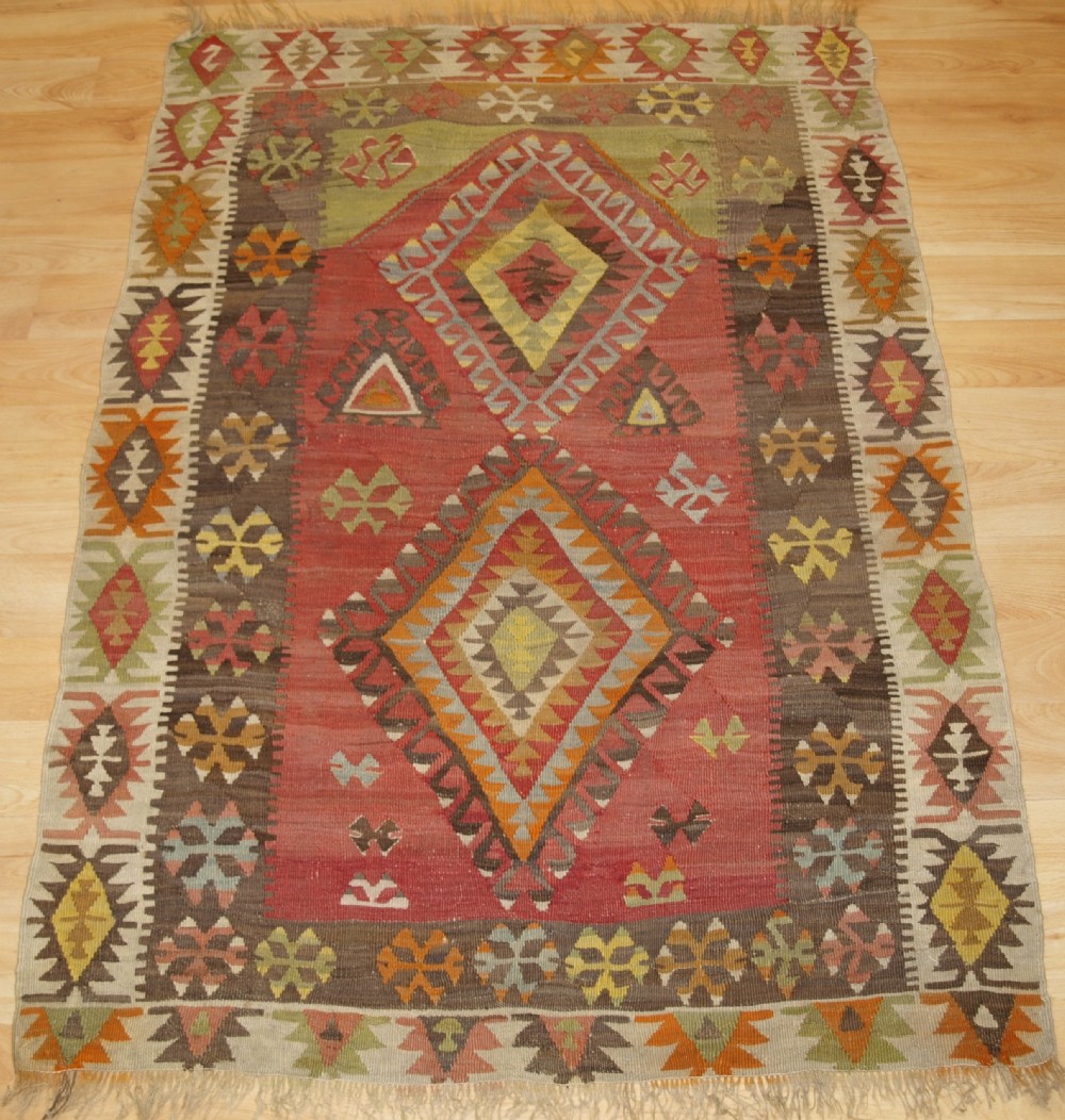 ANTIQUE TURKISH KAYSERI PRAYER KILIM, SOFT PASTEL COLOURS, CIRCA 1920.