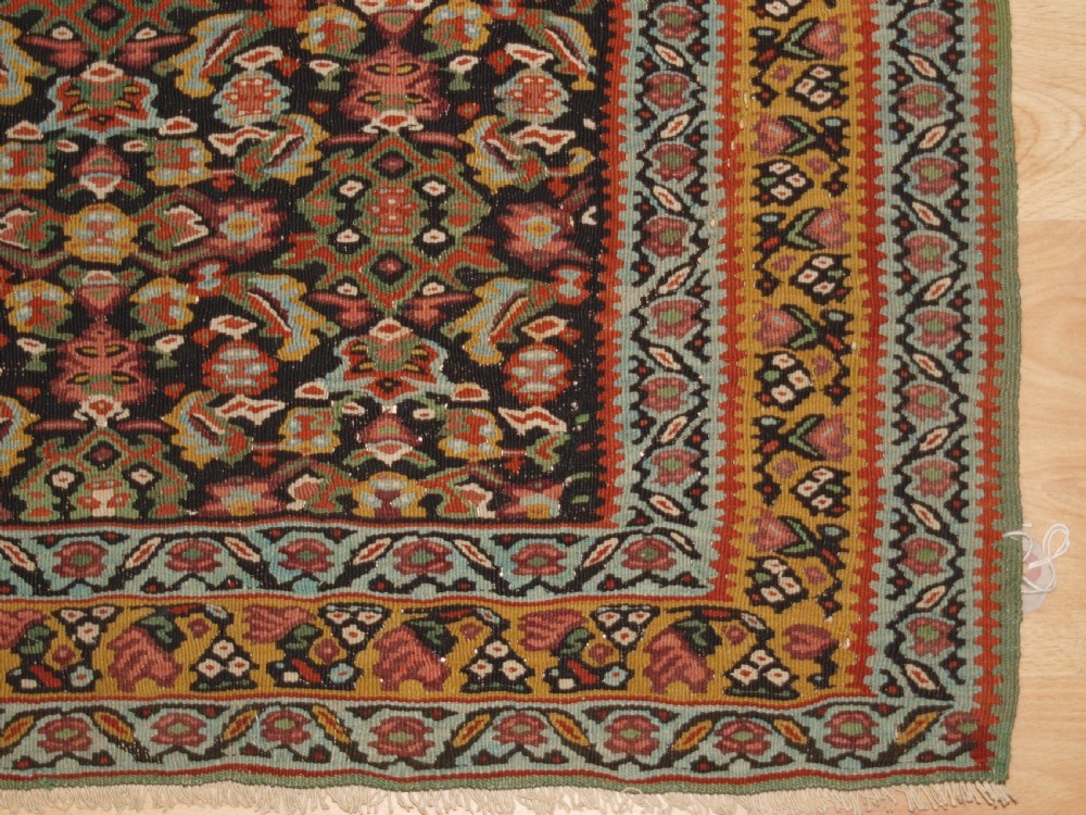 ANTIQUE SENNEH KILIM, SINGLE MEDALLION WITH HERATI, CIRCA 1900. View X