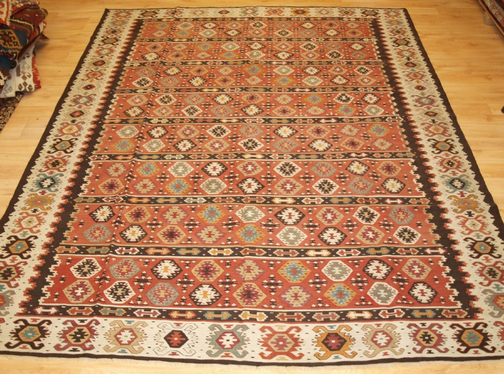 ANTIQUE SHARKOY KILIM WITH REPEAT DESIGN, EXCELLENT CONDITION, CIRCA 1920.