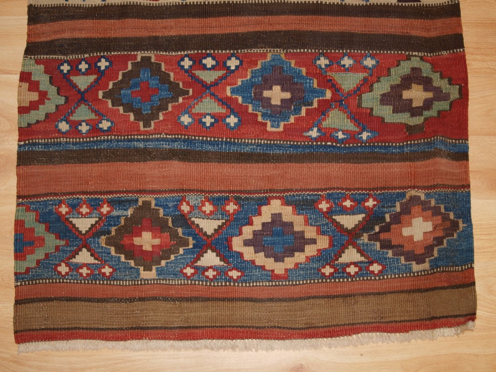 ANTIQUE CAUCASIAN OR SHAHSAVAN KILIM PANEL, CIRCA 1900. View IV