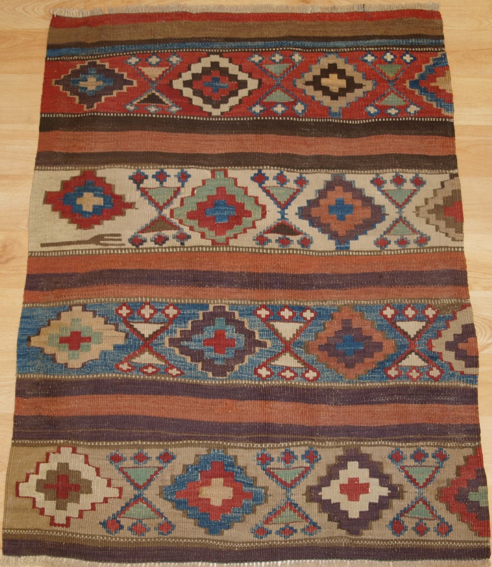 ANTIQUE CAUCASIAN OR SHAHSAVAN KILIM PANEL, CIRCA 1900.