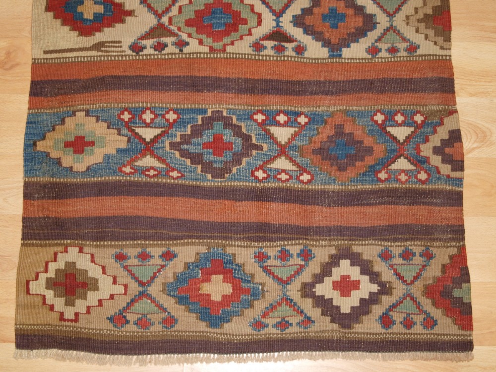 ANTIQUE CAUCASIAN OR SHAHSAVAN KILIM PANEL, CIRCA 1900. View IV