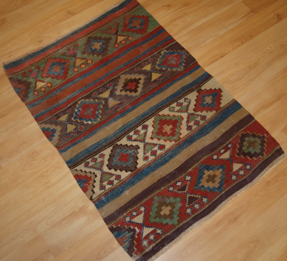 ANTIQUE CAUCASIAN OR SHAHSAVAN KILIM OF SMALL SIZE, CIRCA 1900. View II