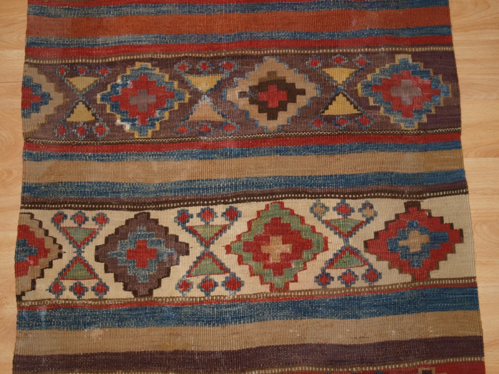 ANTIQUE CAUCASIAN OR SHAHSAVAN KILIM OF SMALL SIZE, CIRCA 1900. View V