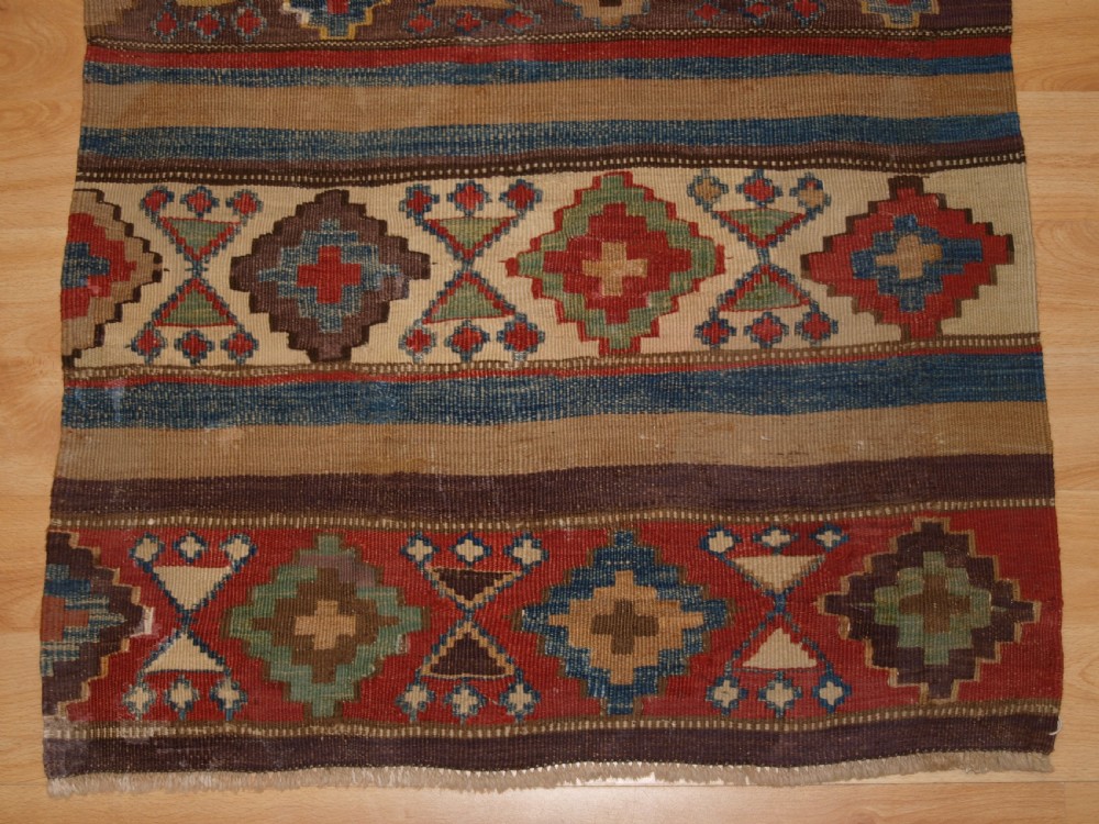 ANTIQUE CAUCASIAN OR SHAHSAVAN KILIM OF SMALL SIZE, CIRCA 1900. View VI