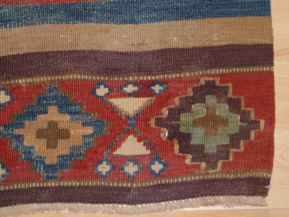 ANTIQUE CAUCASIAN OR SHAHSAVAN KILIM OF SMALL SIZE, CIRCA 1900. View X