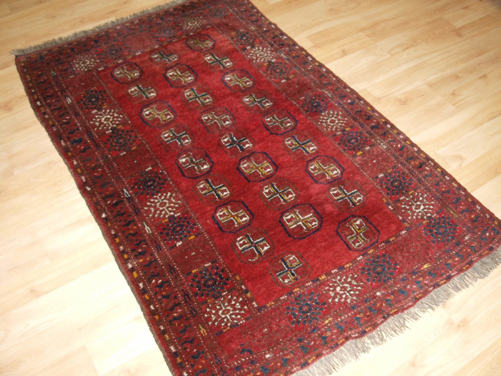 OLD AFGHAN VILLAGE RUG WITH TURKMEN DESIGN, CIRCA 1930. View II