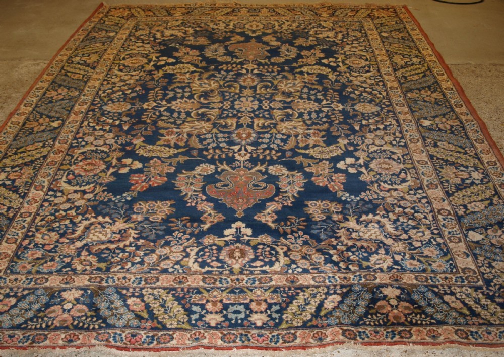 OLD TABRIZ CARPET WITH LARGE SCALE FLORAL DESIGN, CIRCA 1920. View II