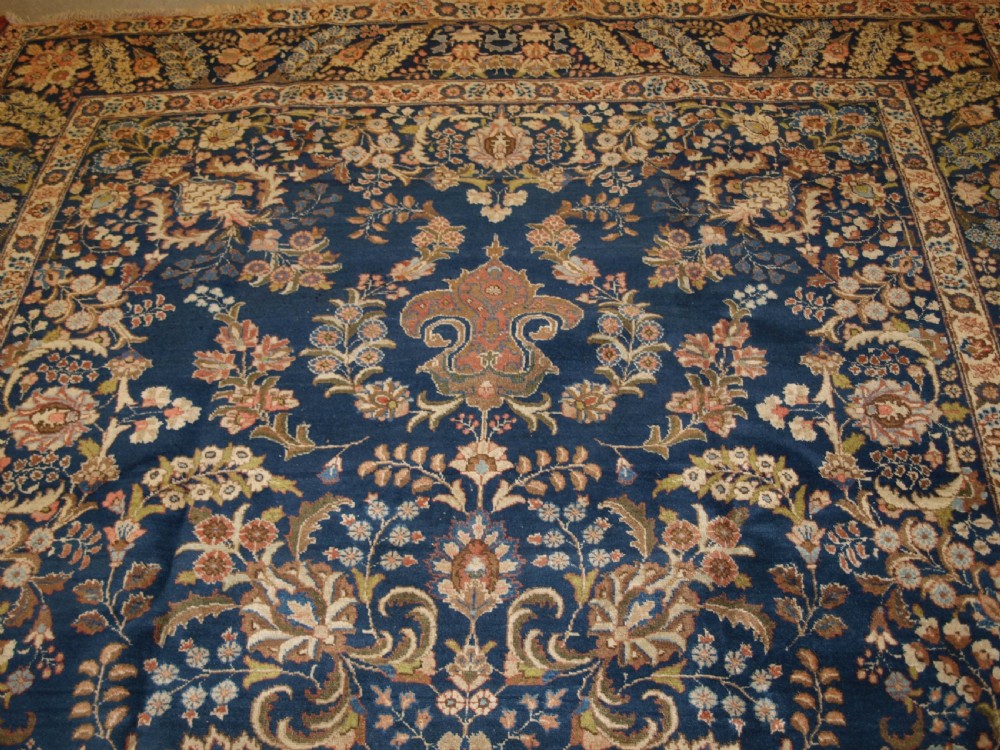 OLD TABRIZ CARPET WITH LARGE SCALE FLORAL DESIGN, CIRCA 1920. View V