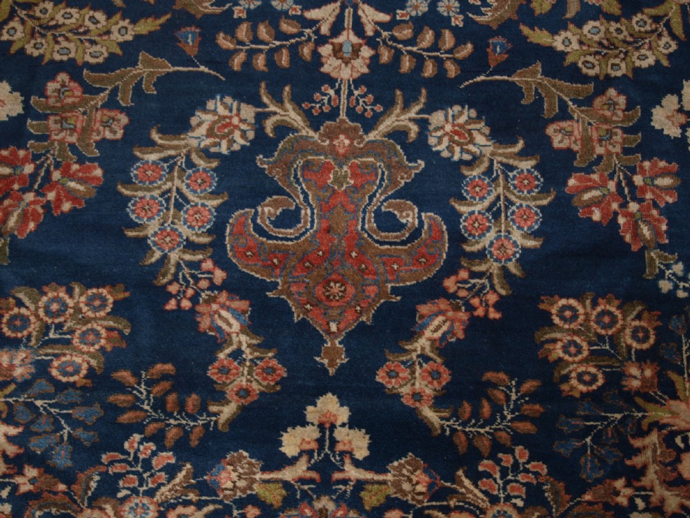 OLD TABRIZ CARPET WITH LARGE SCALE FLORAL DESIGN, CIRCA 1920. View VIII