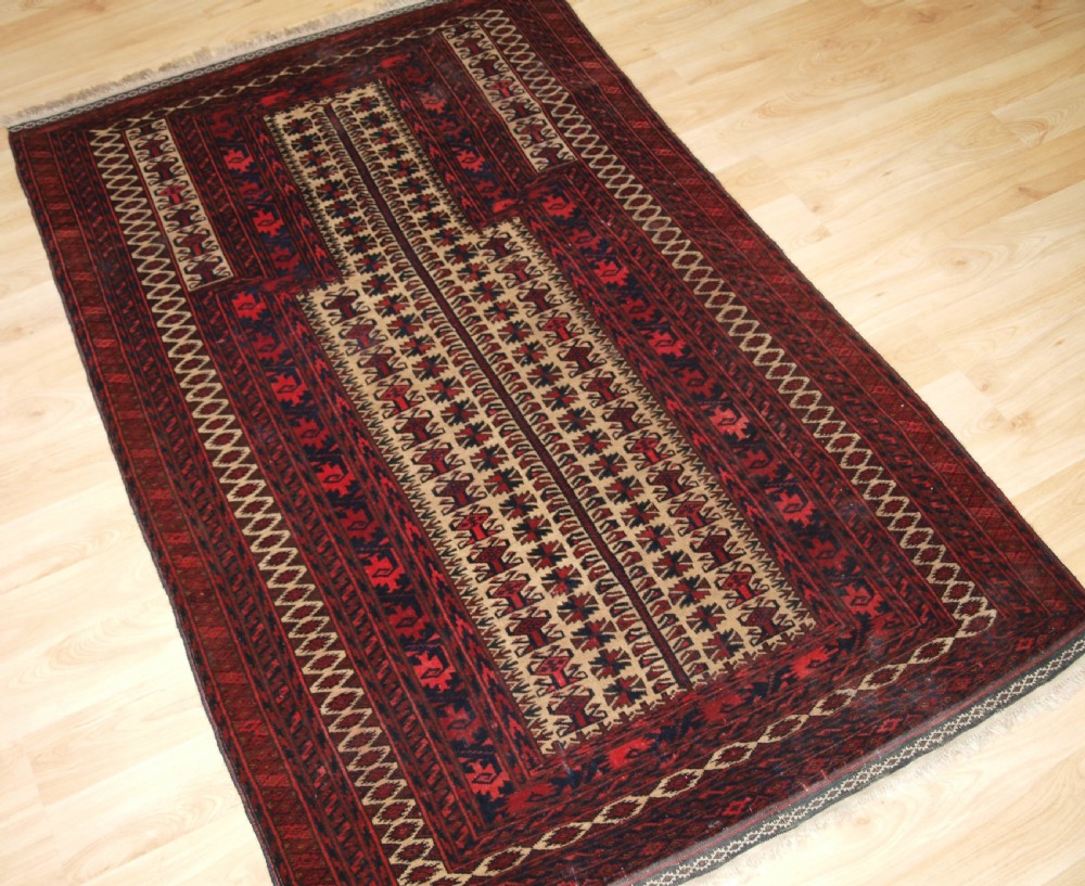 OLD BALUCH CAMEL GROUND PRAYER RUG WITH TREE OF LIFE, CIRCA 1920. View II