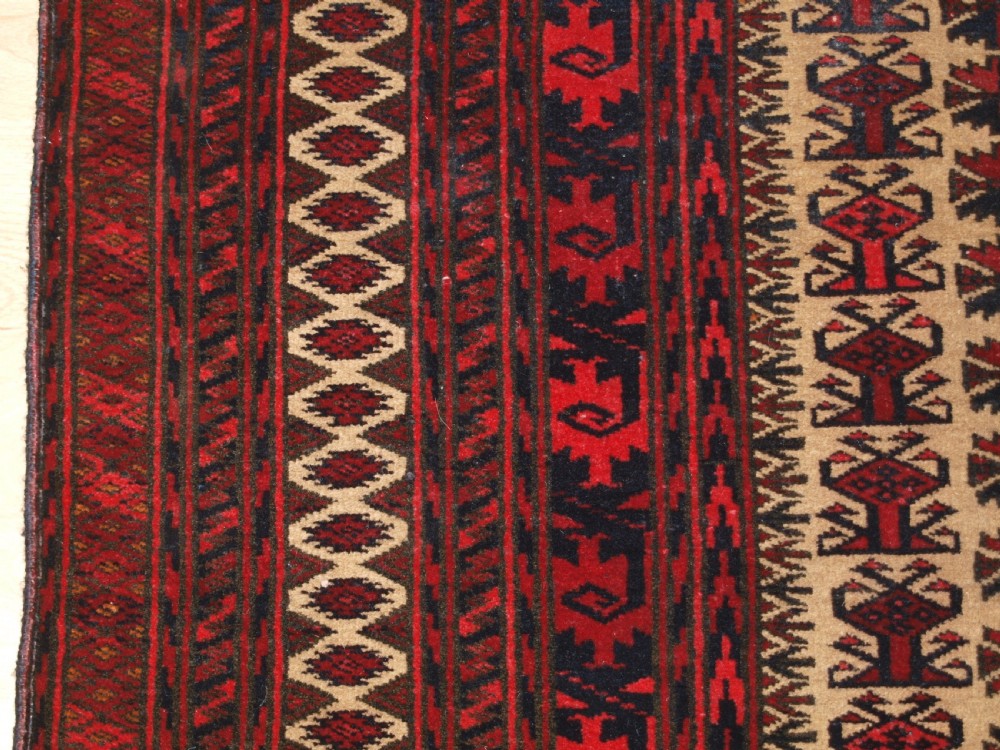 OLD BALUCH CAMEL GROUND PRAYER RUG WITH TREE OF LIFE, CIRCA 1920. View IV